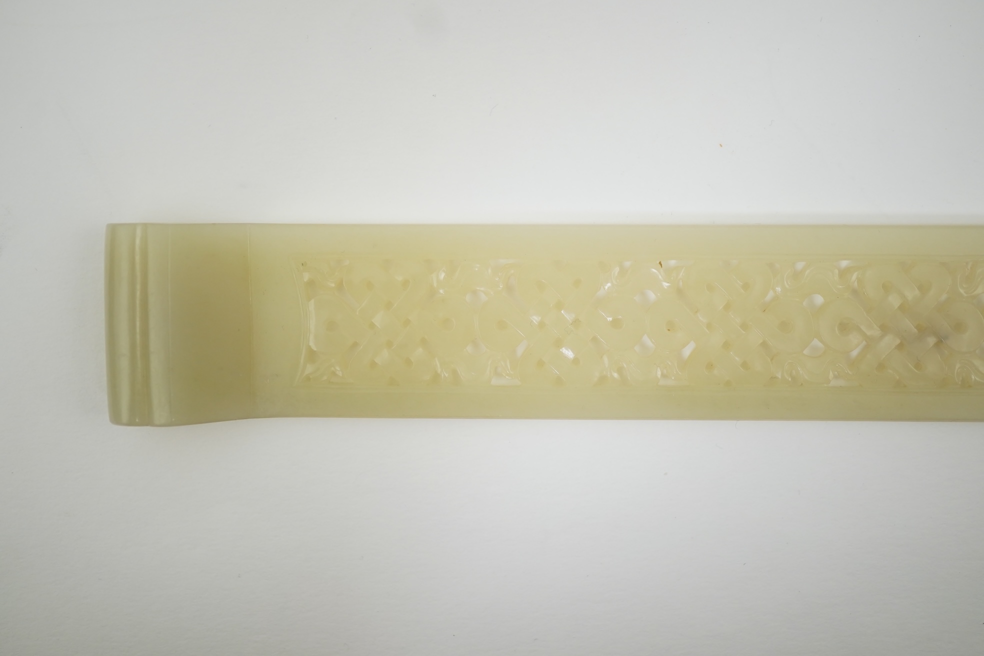 A Chinese pale celadon jade scroll weight